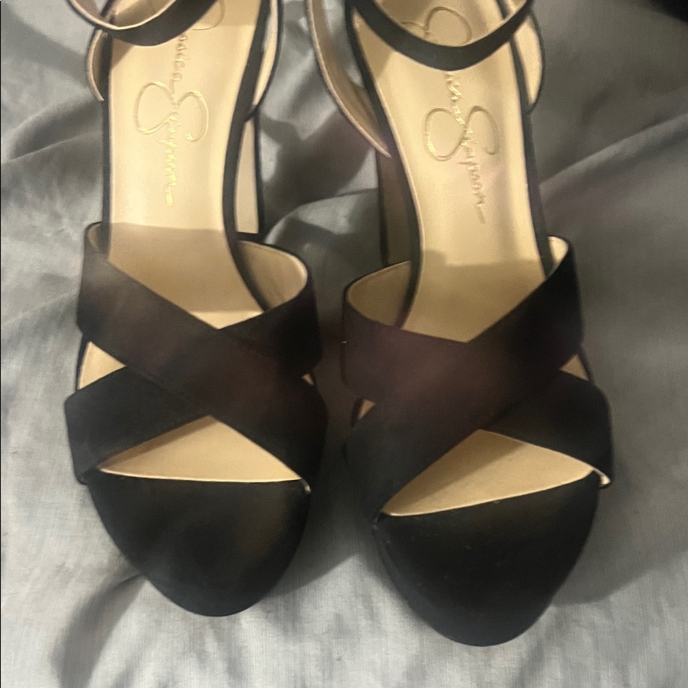 Jessica Simpson has Black Strappy heels